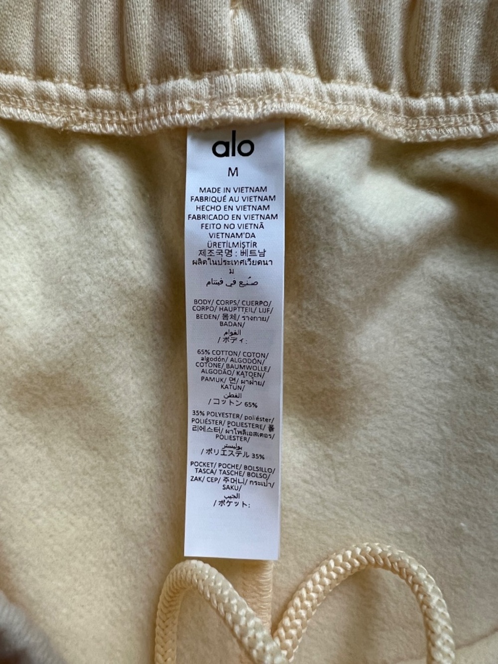ALO Yoga Candlelight Yellow High-Rise Athletic Shorts with Drawstring - Picture 15 of 15